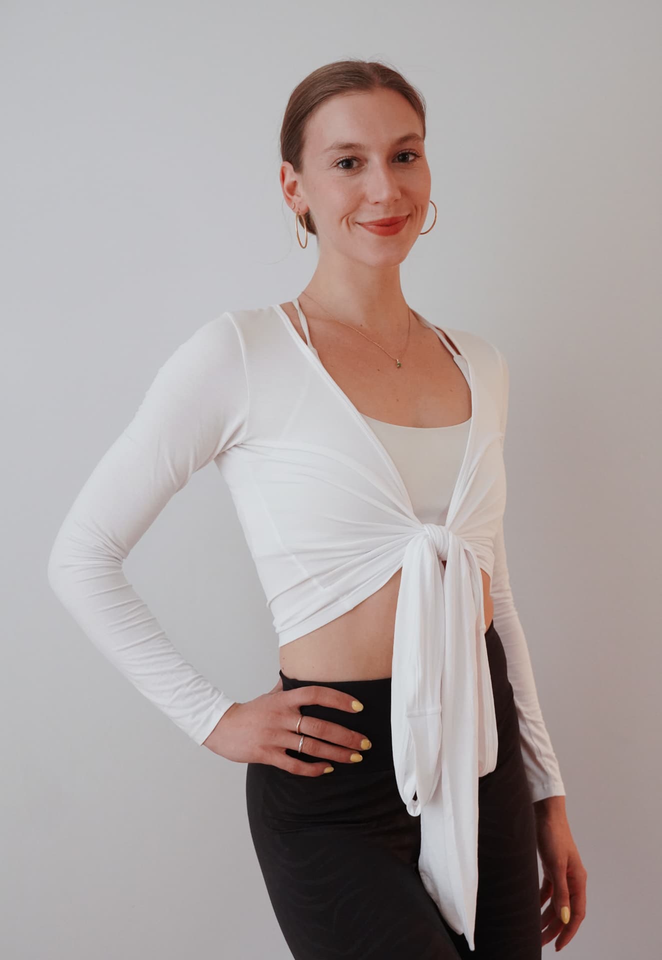 Model wearing the Ballet Wrap Top in Odette