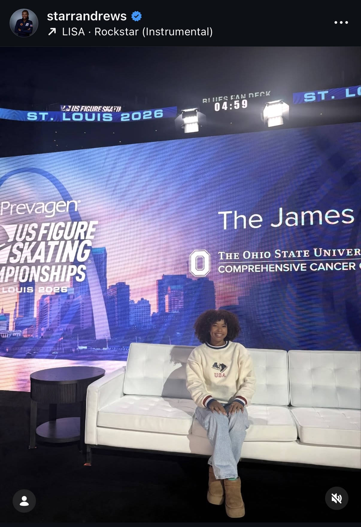 Skater wearing the White USA crewneck at U.S. Figure Skating Championships