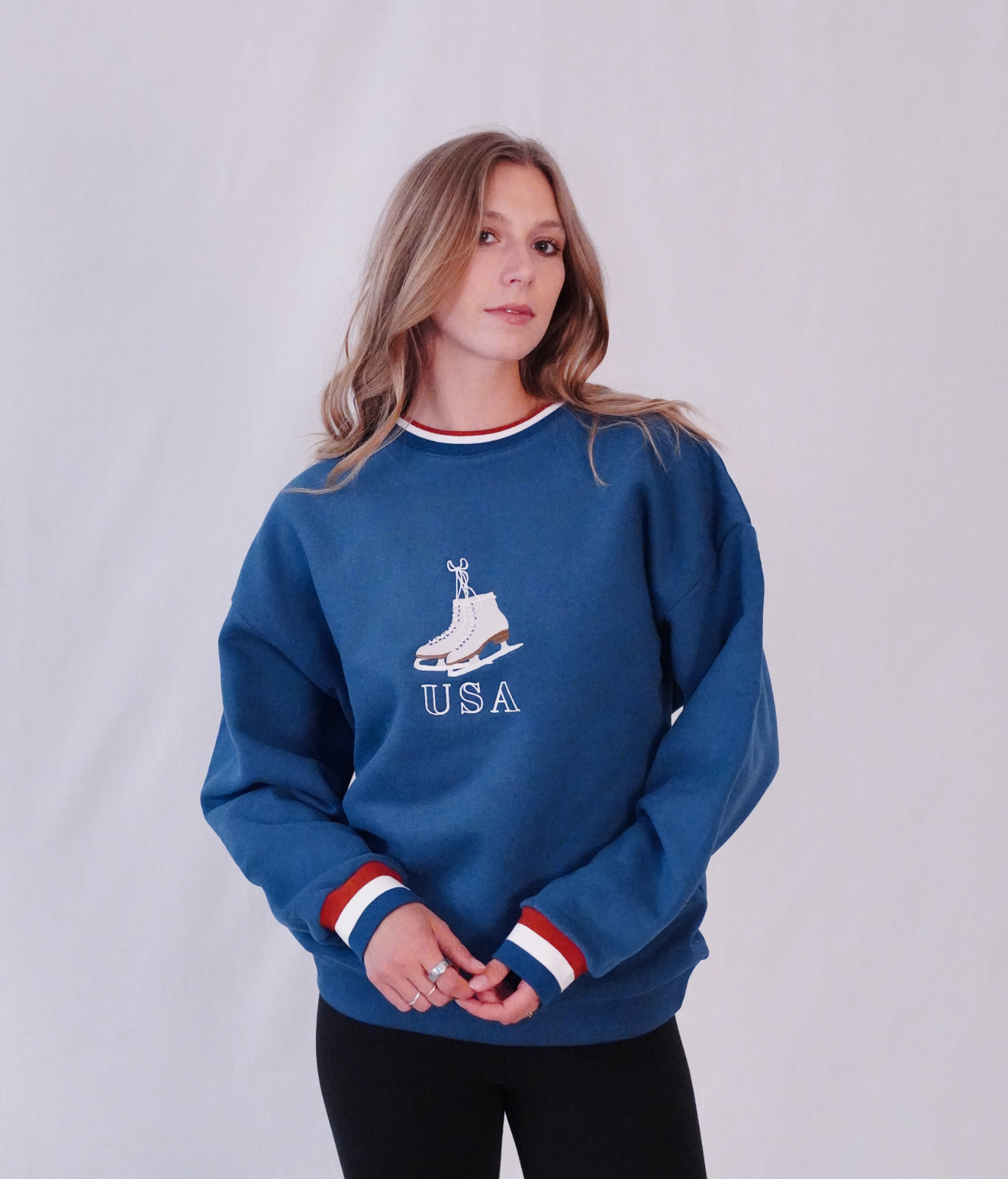 Model wearing the blue USA crewneck