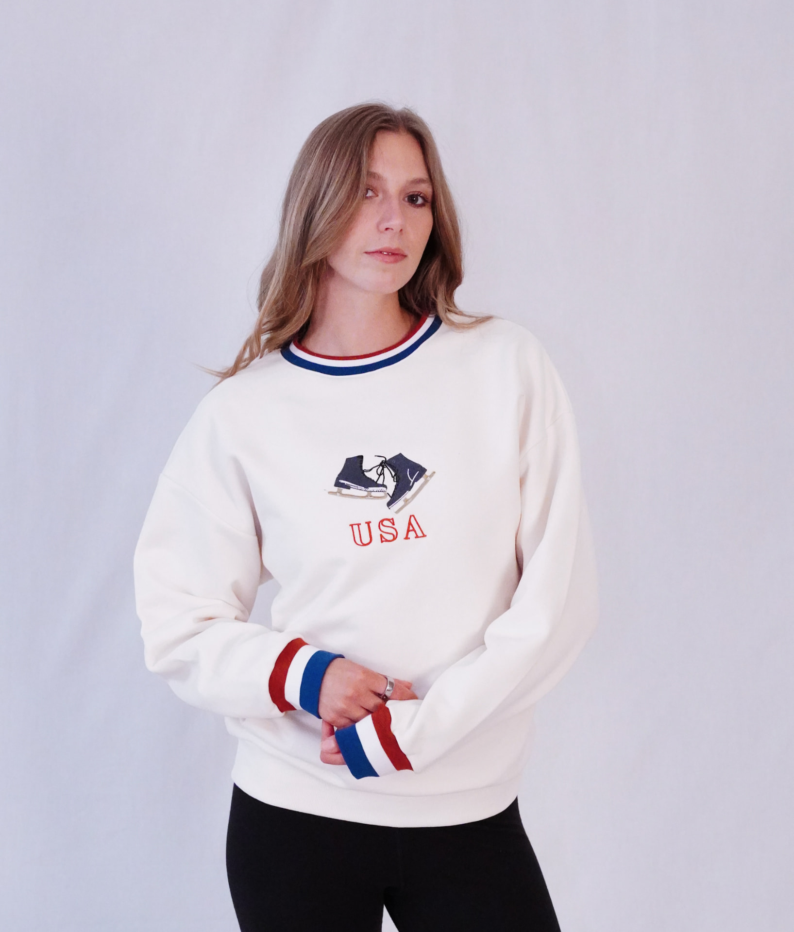 Model wearing the white USA crewneck