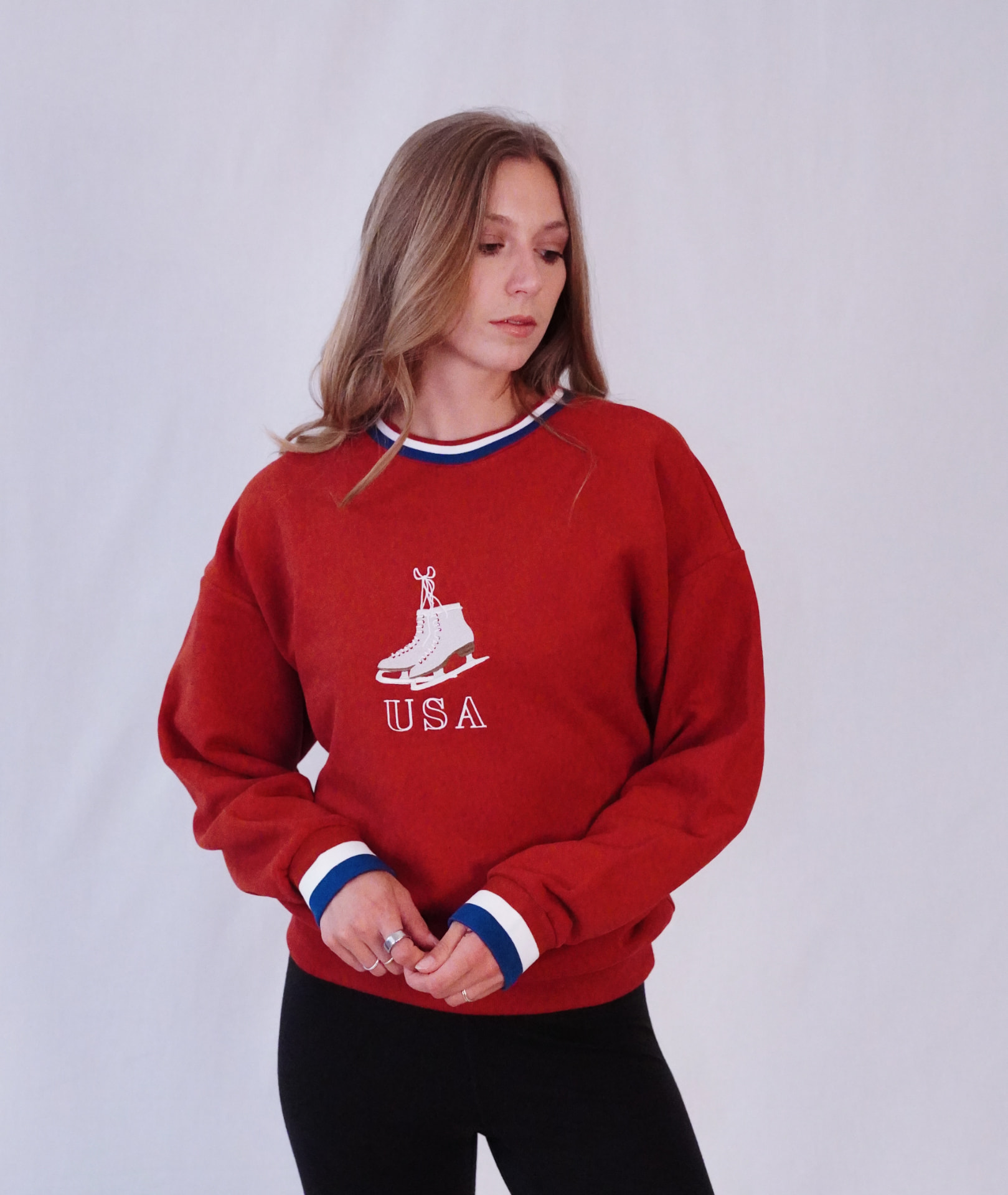 Model wearing the red USA crewneck